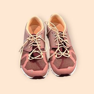 QC women’s running shoes cloud foam soles size W9. $250